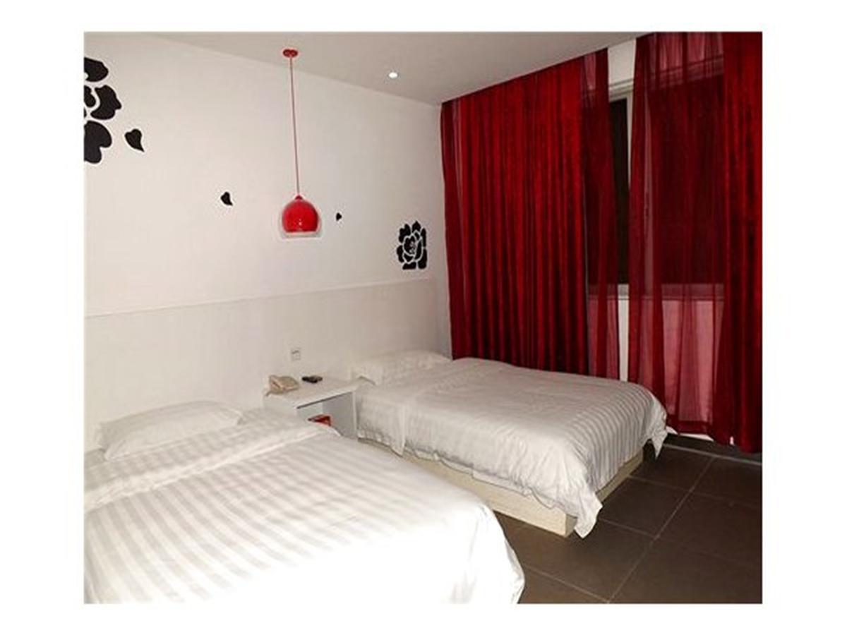 גואנגג'ואו V8 Hotel Xilang Subway Branch מראה חיצוני תמונה