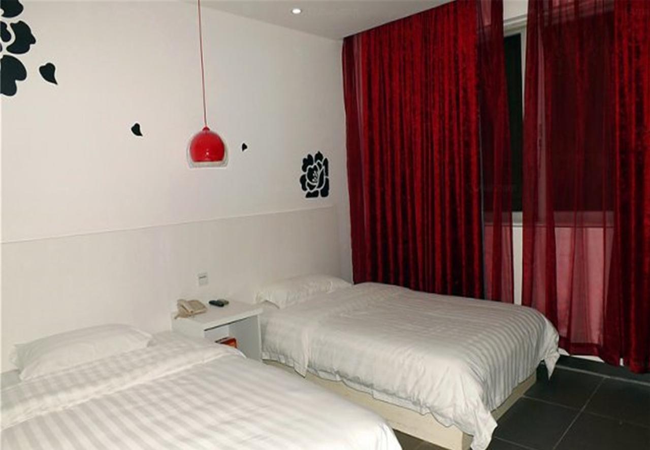 גואנגג'ואו V8 Hotel Xilang Subway Branch מראה חיצוני תמונה